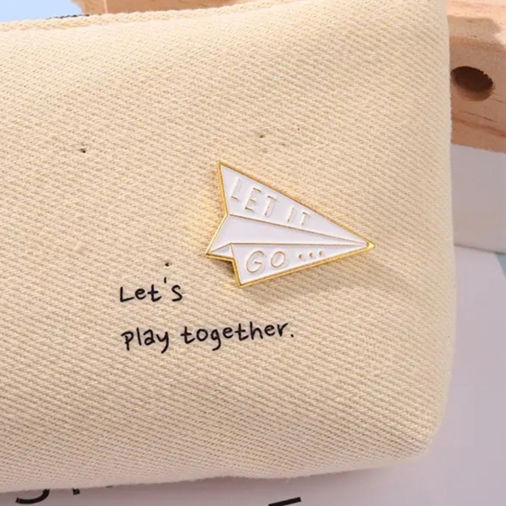 **Paper airplane enamel pin**